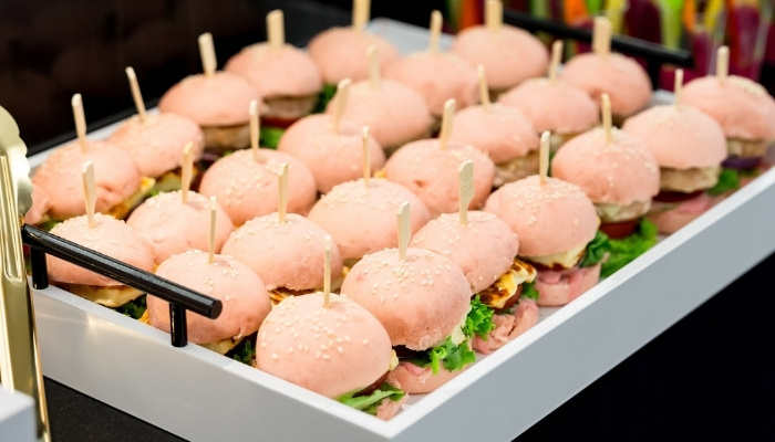 Tray with mini burgers at a catered party in Toronto