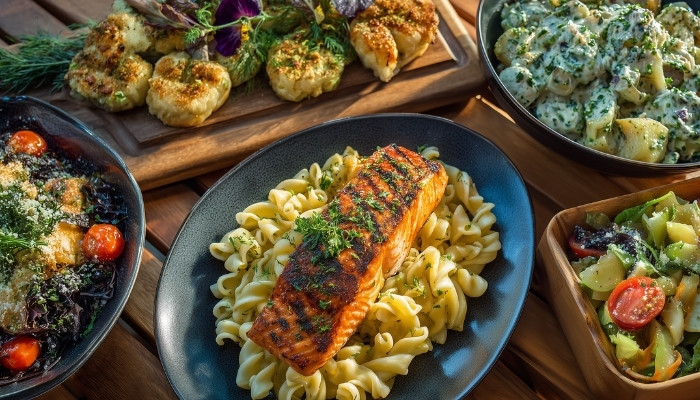 Family-style Italian platters on a long table