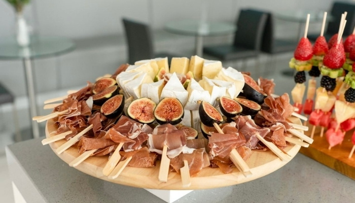 Family-style platters on a party dining table