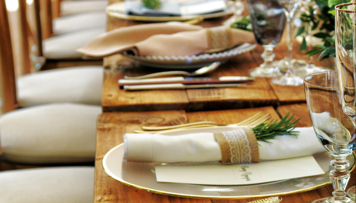Elegant plated dinner setting with napkin and cutlery